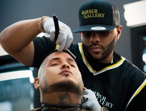 Barber working on a client