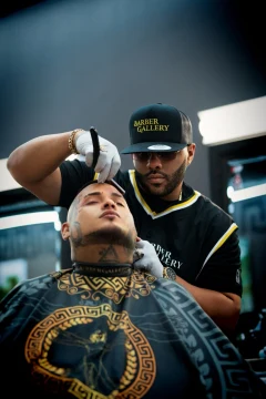 Barber refining a haircut