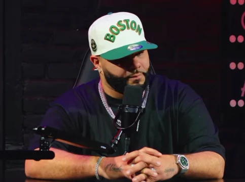A man speaking into a microphone